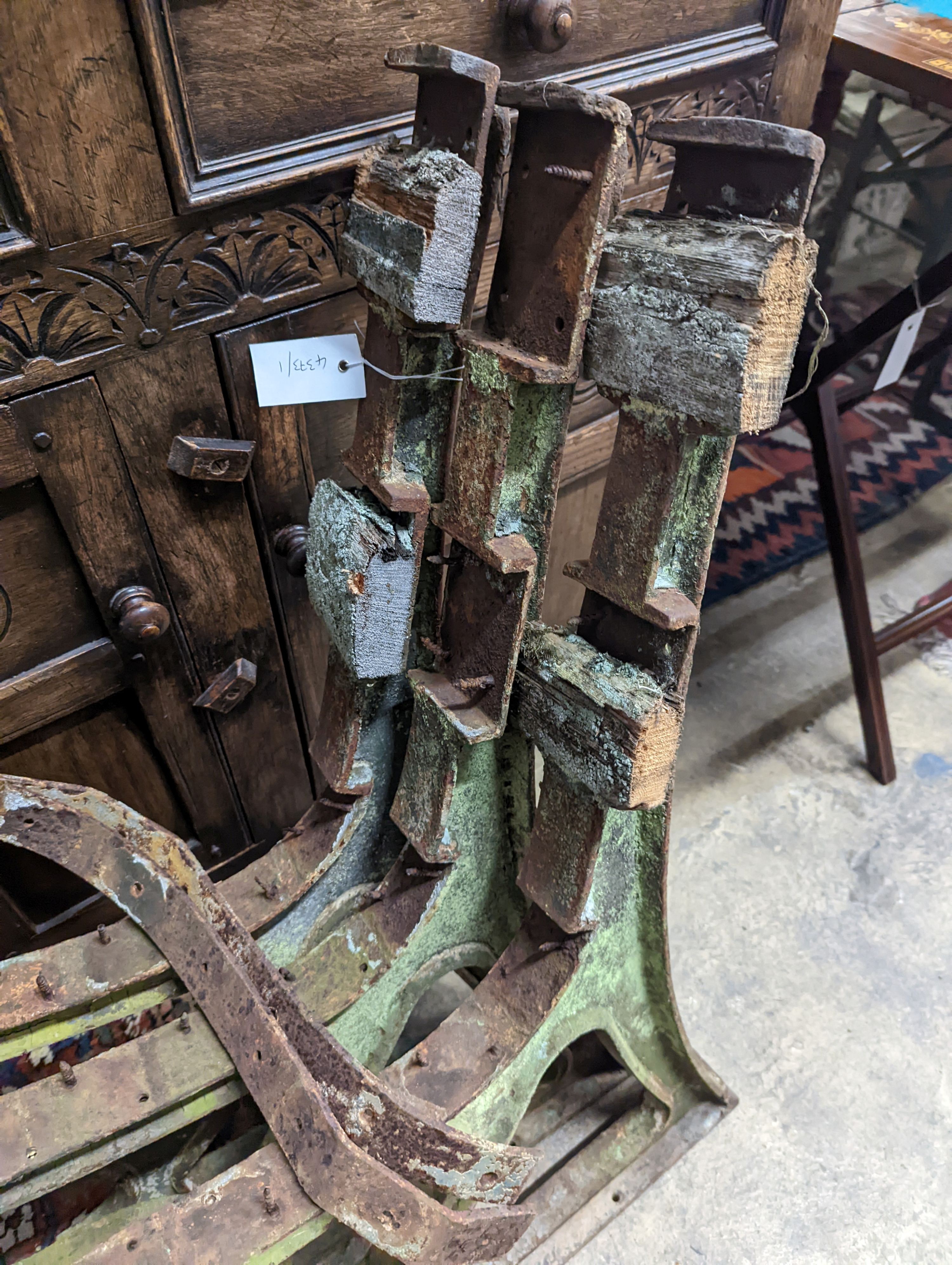 An early 20th century cast iron three section bench frame, probably marine or municipal, height 85cm